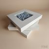 Axis swivel coffee table with rotating lacquered tiers and sealed stone inset – Itae Furniture
