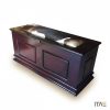 Isiko Kist, a dark solid wood lobola kist with a cowhide-cushioned lid, studio product shot