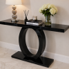 Onyx gloss black server table with a single oval ring base, styled with a lamp, diffuser, books and hydrangeas