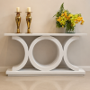 Triad gloss white server table with three interlocking ring legs, styled with candlesticks and florals — Itae Furniture