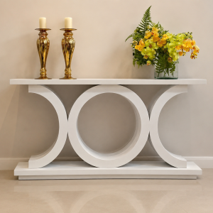 Triad gloss white server table with three interlocking ring legs, styled with candlesticks and florals — Itae Furniture