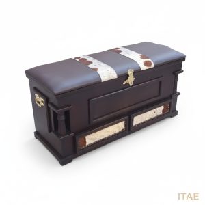 Ubukhosi Kist, solid wood kist with turned corner posts, cowhide-stripe lid, and ornate brass hardware